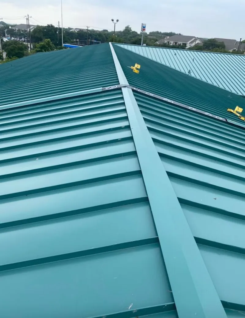 Green commercial metal roof ridge and valley for Metal Roof Repair in Tomah
