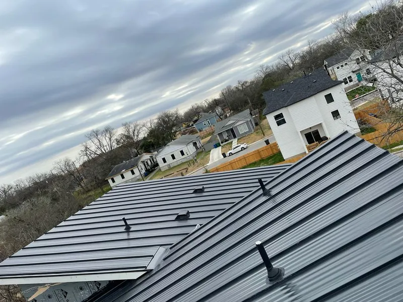 Standing seam metal roof panels with vents for Skylight Repair in Tomah